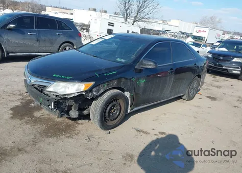 2014 Toyota Camry Le z USA, uszkodzony, nr VIN 4T4BF1FK0ER384143
